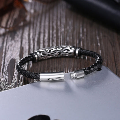Black braided leather bracelet with silver clasp and decorative metal bar