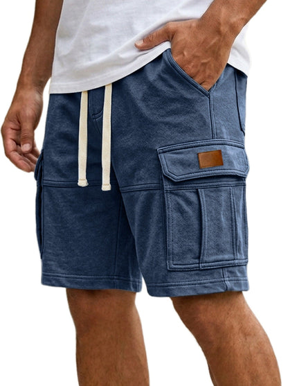 Blue cargo shorts with a white drawstring on a white background
