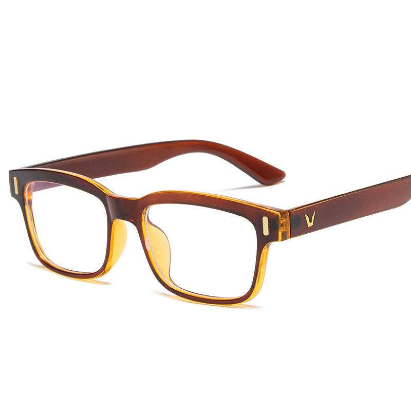 Brown and yellow eyeglasses on a white background