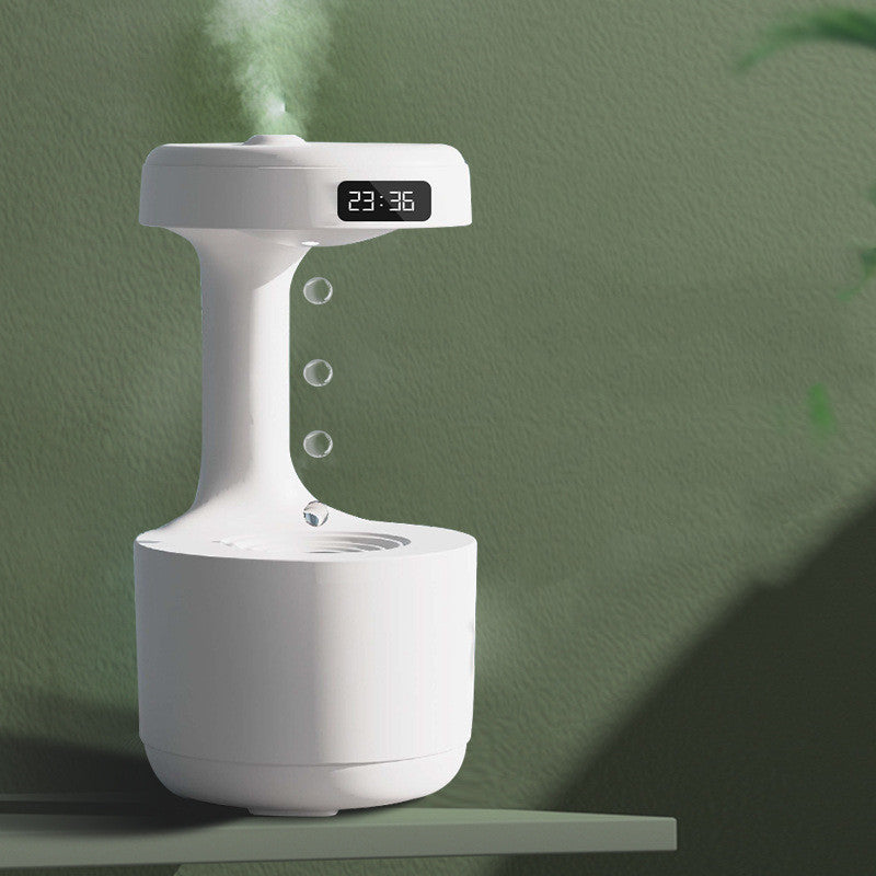 White humidifier with digital display on a green background