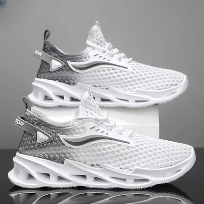White and gray athletic shoes on a reflective surface with a gray background