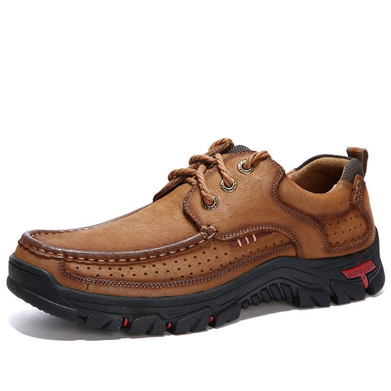 Brown leather shoe with black sole on a white background