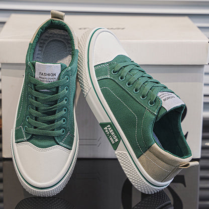 Green sneakers with white soles on a reflective surface