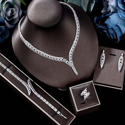 Zircon necklace set with matching drop earrings, bracelet, and ring in gift boxes