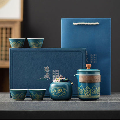 Tea set with blue packaging on a dark surface