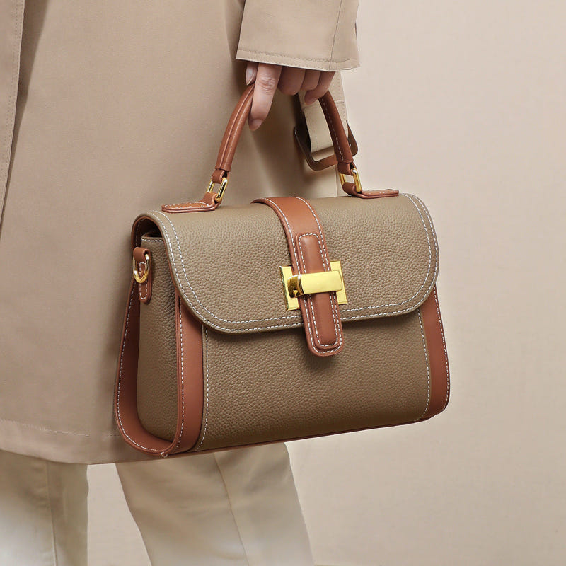Women’s leather satchel with flap front, camel body, contrast brown shoulder strap, gold hardware