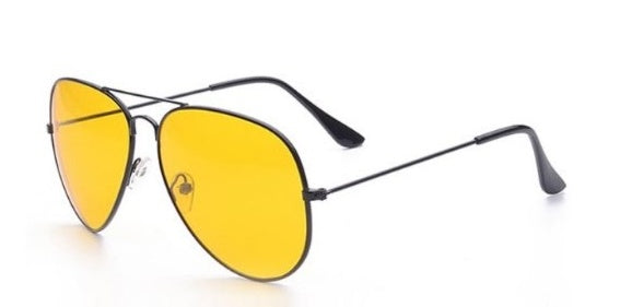 Yellow sunglasses with black frames on a white background