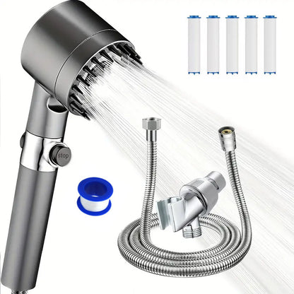 Handheld shower head spraying water with metal hose and connectors