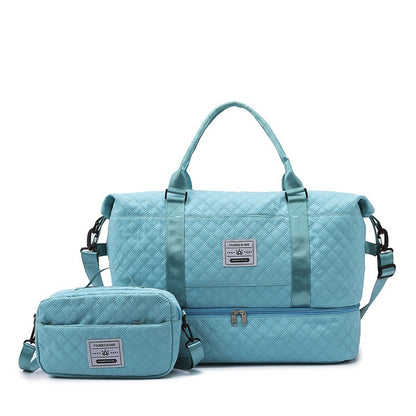 Light blue quilted travel bag with front zip and matching crossbody pouch