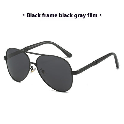 Black frame sunglasses with black gray film lenses on a white background