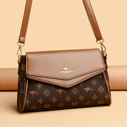 Brown handbag with kangaroo logo on a beige background