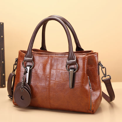 Retro classic large-capacity leather-look handbag in brown with twin top handles and side straps