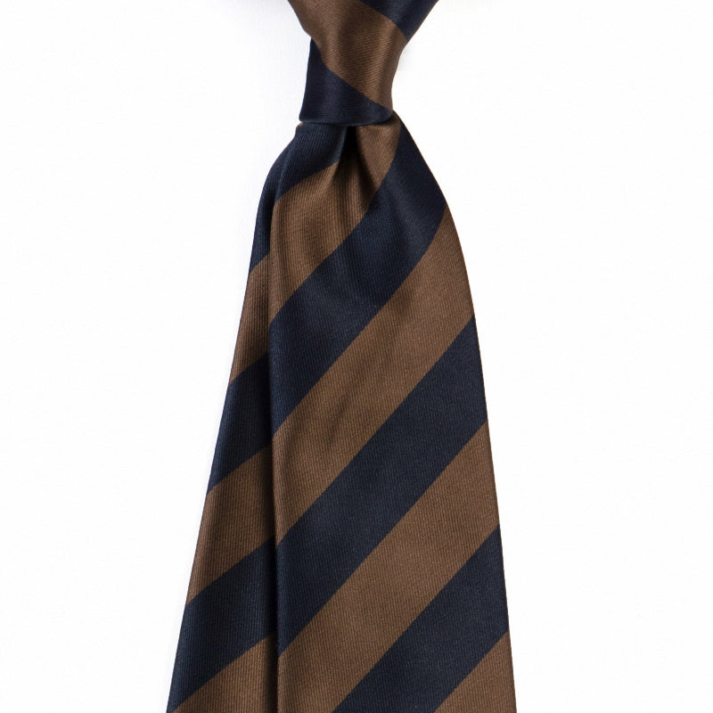 Brown and navy striped tie on a white background