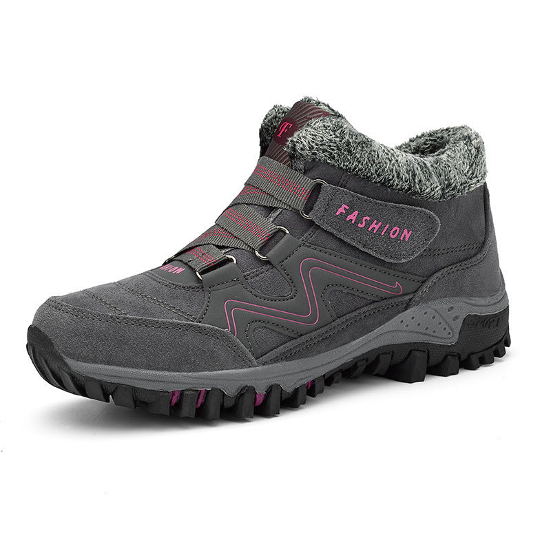Mid-cut casual sports shoes with thick sole, dark gray upper with fuzzy collar and pink lacing.