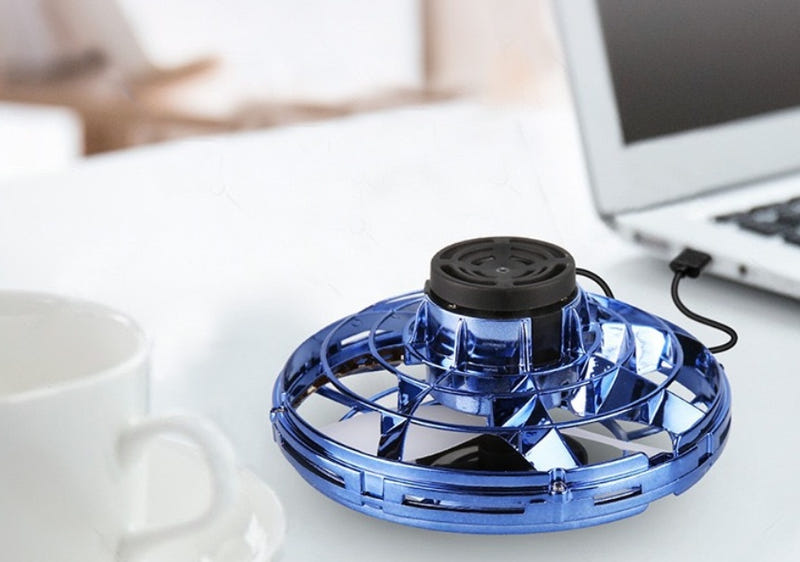 Blue mini fingertip spinning toy drone with black top plate