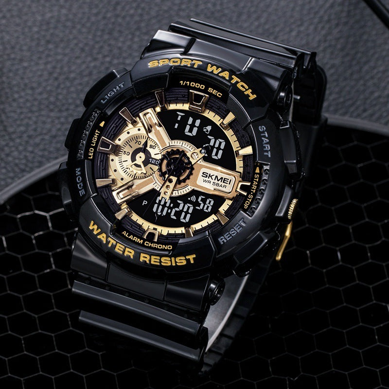 Black and gold sports watch with digital and analog display on a textured black background