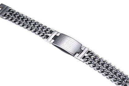 Close-up of a silver chain bracelet on a white background