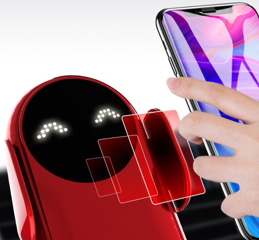 Red car wireless phone holder with infrared-style charging rings and finger nearby