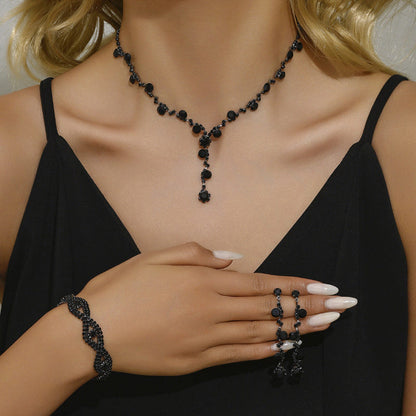 Black crystal necklace with pendant, matching bracelets and dangling earrings set