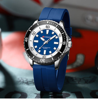 Angled view of a CURREN quartz watch with blue dial and strap and a black bezel