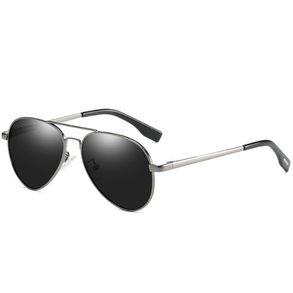 Sunglasses with black lenses and silver frame on a white background
