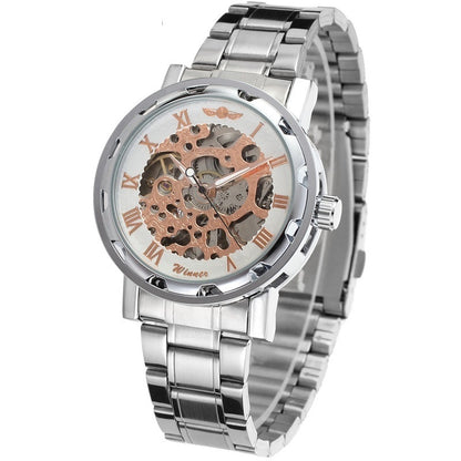 Silver watch with a detailed mechanical face on a white background