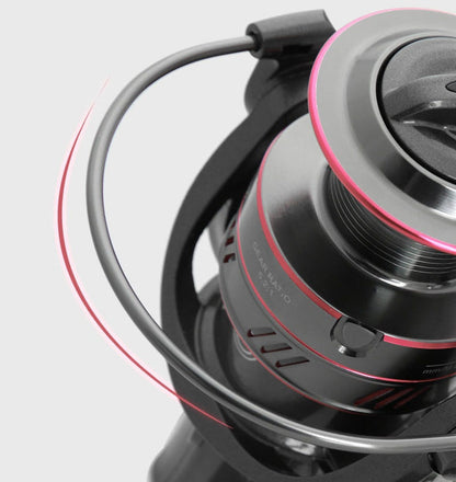 Full metal fishing reel close-up of gray spool with black bail and handle arm