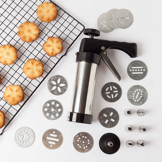 Manual biscuit press with interchangeable stamping discs and crank handle