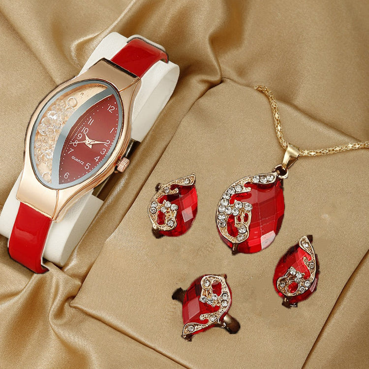 Quartz watch jewelry set with red strap and red teardrop earrings on gold chain