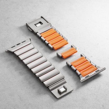 Magnetic titanium watch strap with orange silicone links and metal clasp