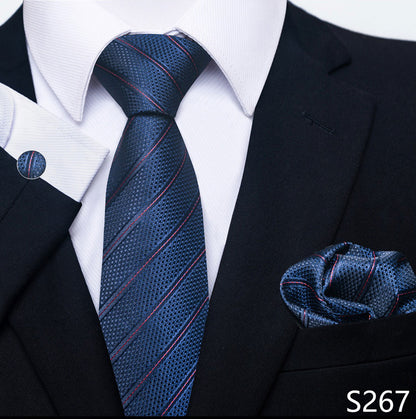 Blue striped tie with matching pocket square on a suit, brand 'S267' visible.
