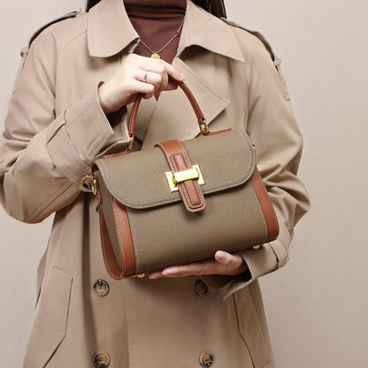 Women’s leather handbag satchel with flap, camel body, contrast brown straps, gold clasp