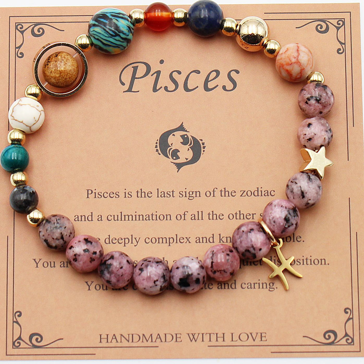 Pisces zodiac stone bracelet with purple and pink beads, gold tone accents, star and cross charms
