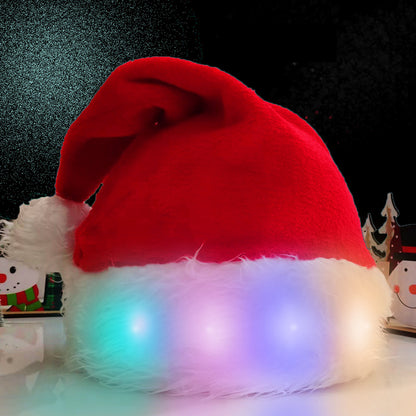 Red Santa hat with LED lights on a dark background