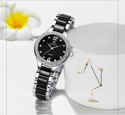 Black ceramic quartz watch with black dial, rhinestone bezel, metal link bracelet