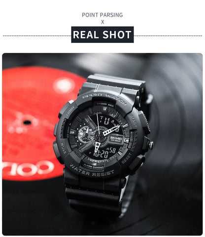 Black wristwatch with digital and analog display on a blurred background