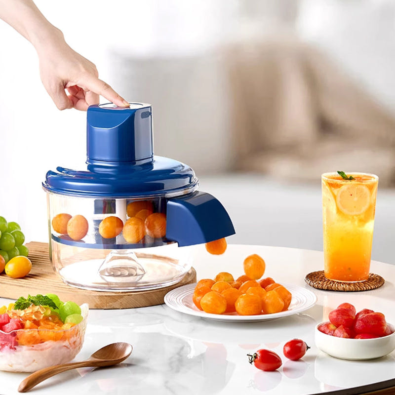 Blue electric grape peeler with clear container and side chute for dispensing grapes