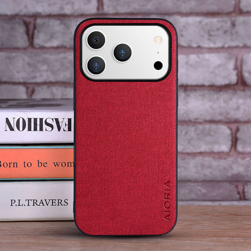 iPhone PU leather case in red with textured back, raised camera openings, AIORIA logo