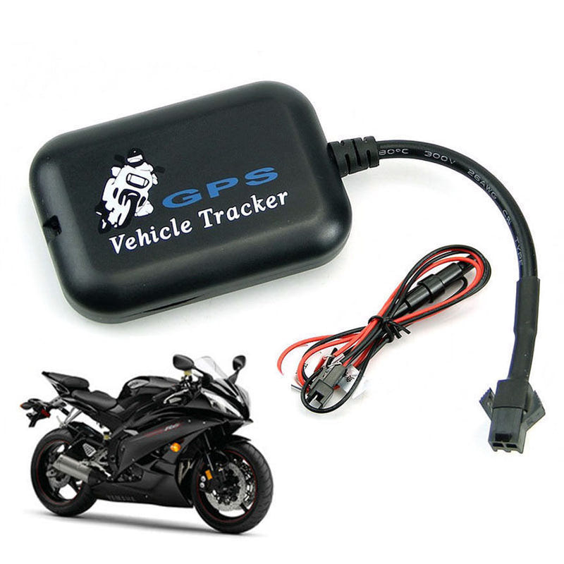 Black GPS vehicle tracker box with wiring harness and connectors