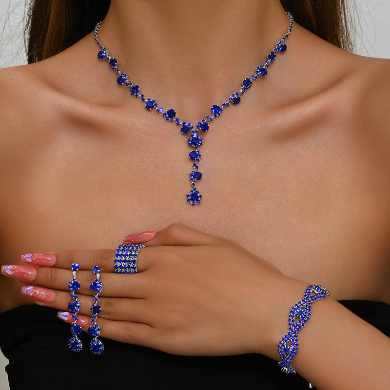Royal blue crystal necklace with drop pendant, matching bracelets and ring set