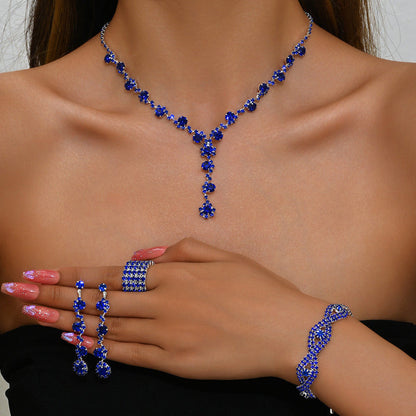 Royal blue crystal necklace with drop pendant, matching bracelets and ring set