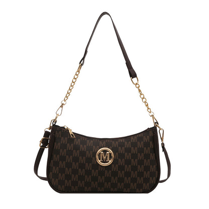 Women’s dark brown monogram shoulder pouch bag with gold chain strap and side buckles