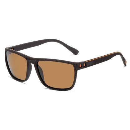 Sunglasses with brown lenses and black frame on a white background