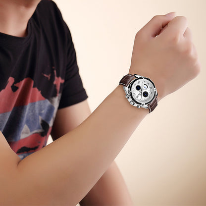 MEGIR quartz watch with white dial and brown stitched strap shown on a raised wrist