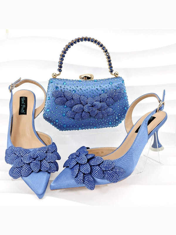 Sky blue rhinestone heeled shoes with matching beaded handbag and 3D flower accents