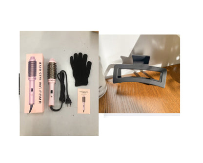 Pink hair styling comb with packaging, black glove, and hair clip on a white surface.