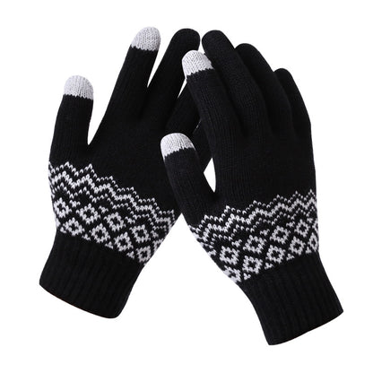 Pair of black gloves with white patterned cuffs on a white background