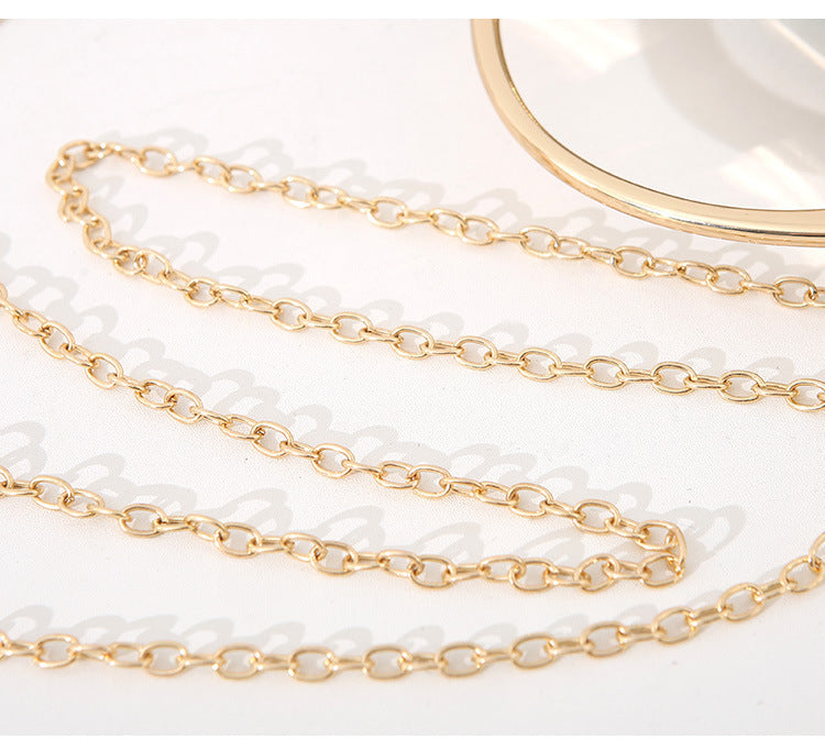 Gold chain on a white background