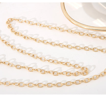 Gold chain on a white background