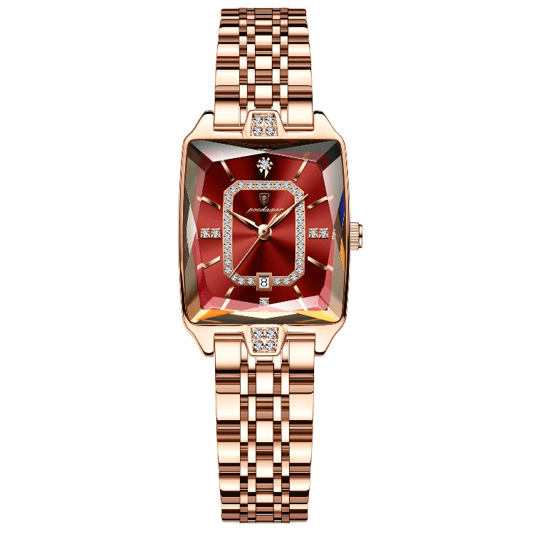 Luxury watch with rose gold strap and red face on a white background